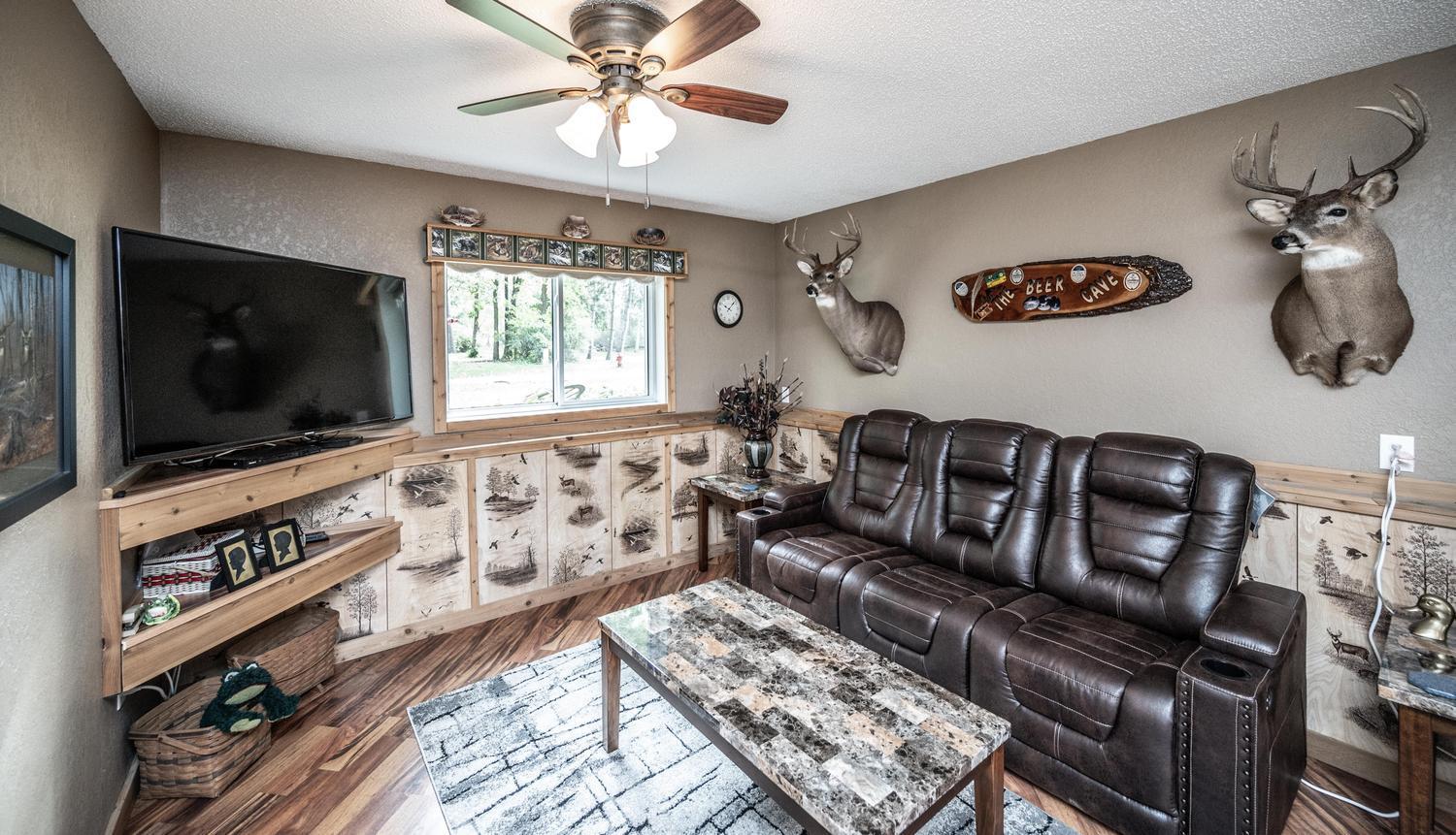 Flexible living space! This bedroom is currently used as a living room but could easily become a spacious basement primary suite with an adjoining 3/4 bath.