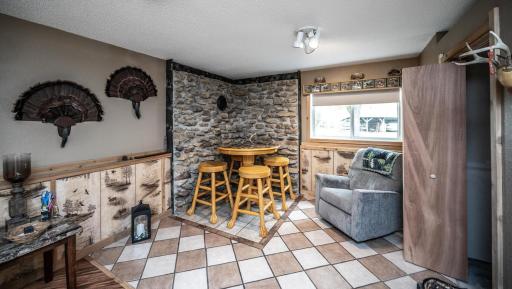 Ready for a cozy touch! The existing setup is ready for a wood-burning stove or fireplace to create a warm and inviting space.