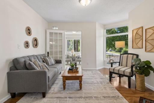 Sunny Living Room with charming accent fireplace
