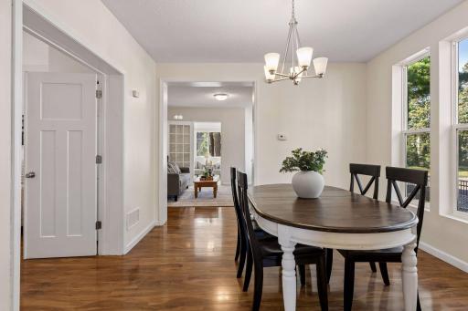 Dining Room opens to Living Room and Kitchen with access to Main Level Bedroom or Office!