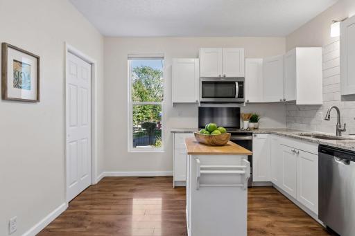 Pantry closet and large window with view of backyard!