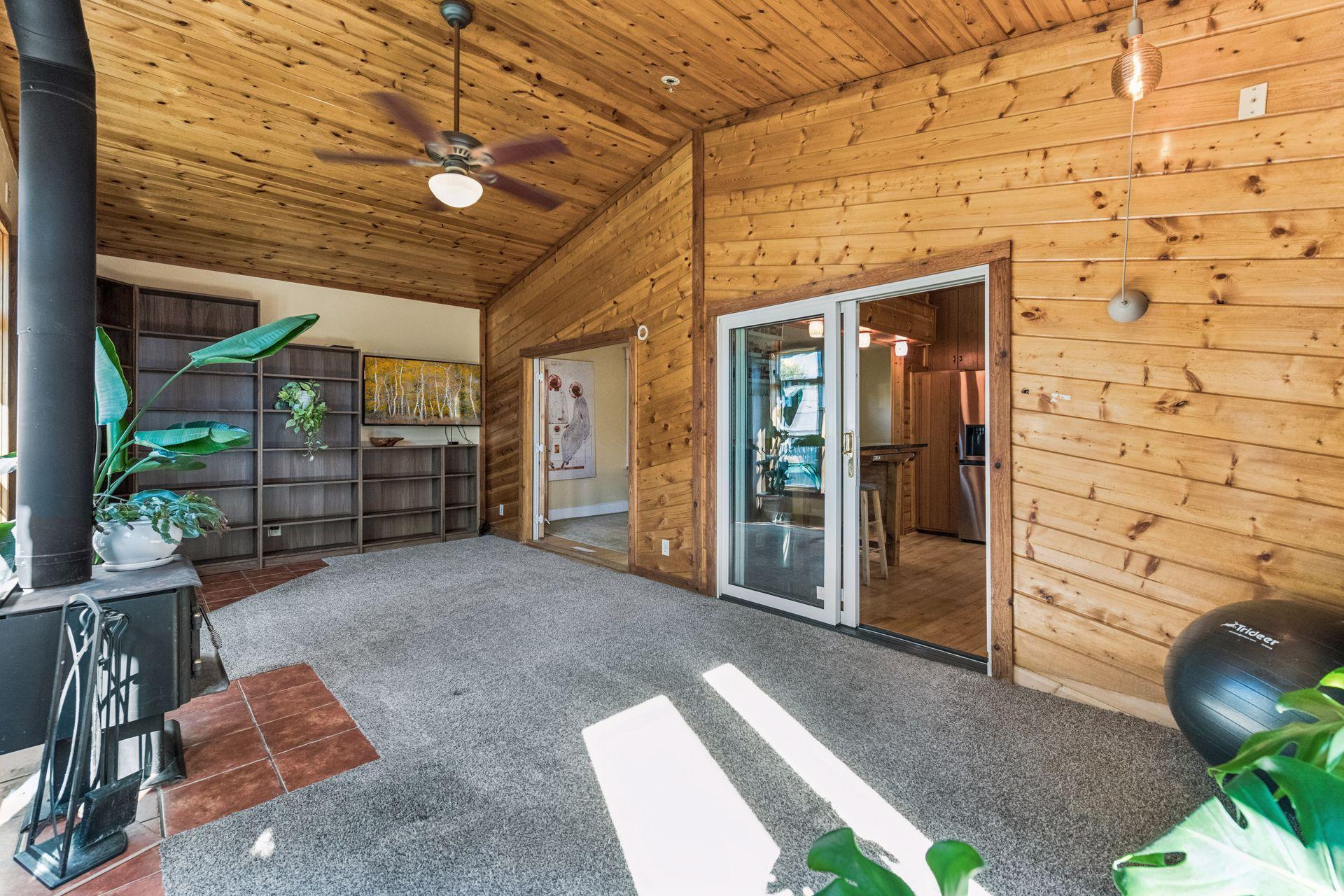 This generous sunroom conveniently connects to the kitchen and dining area.