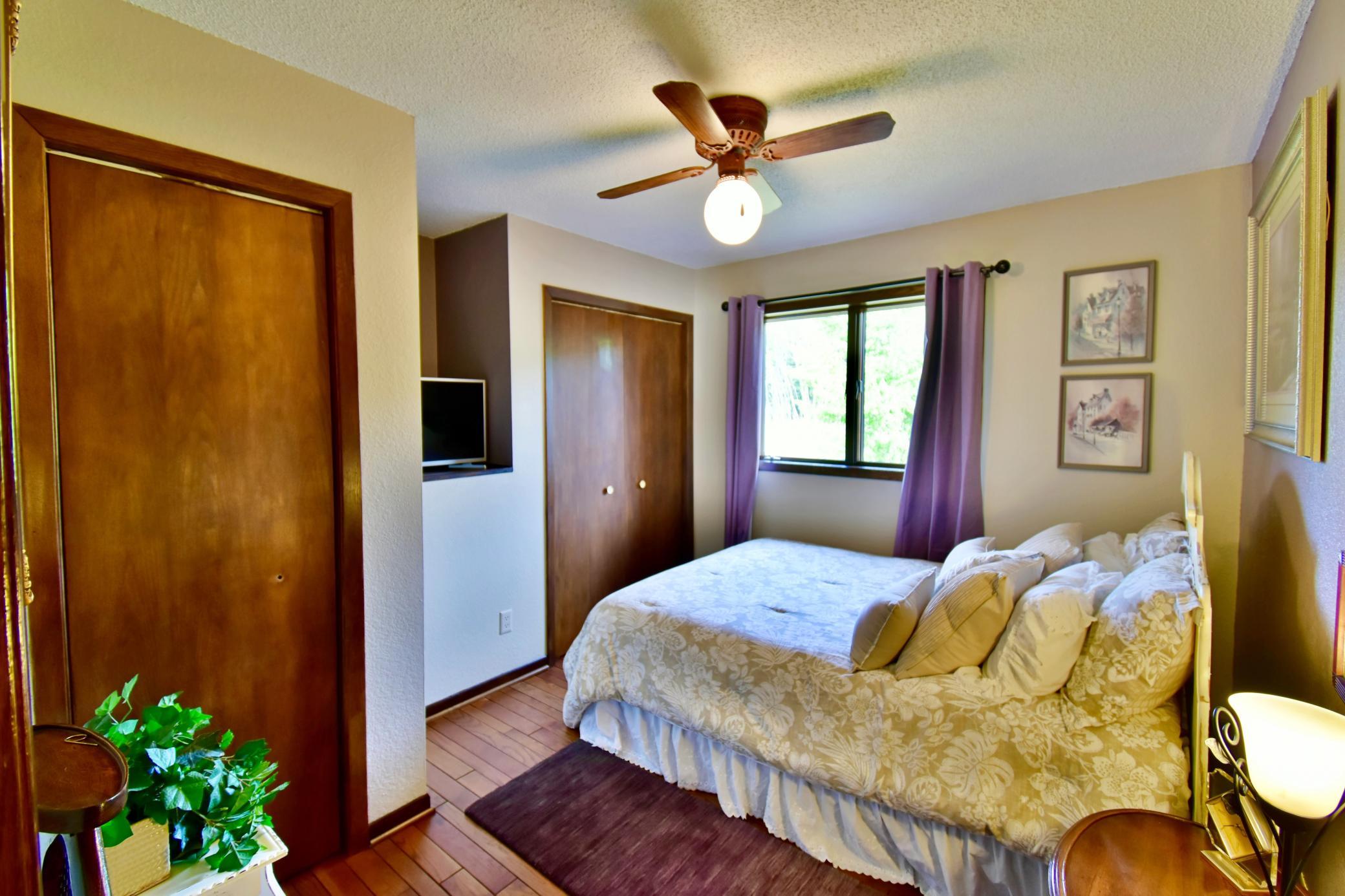 Upper level bedroom 2. Nice storage with two closets.