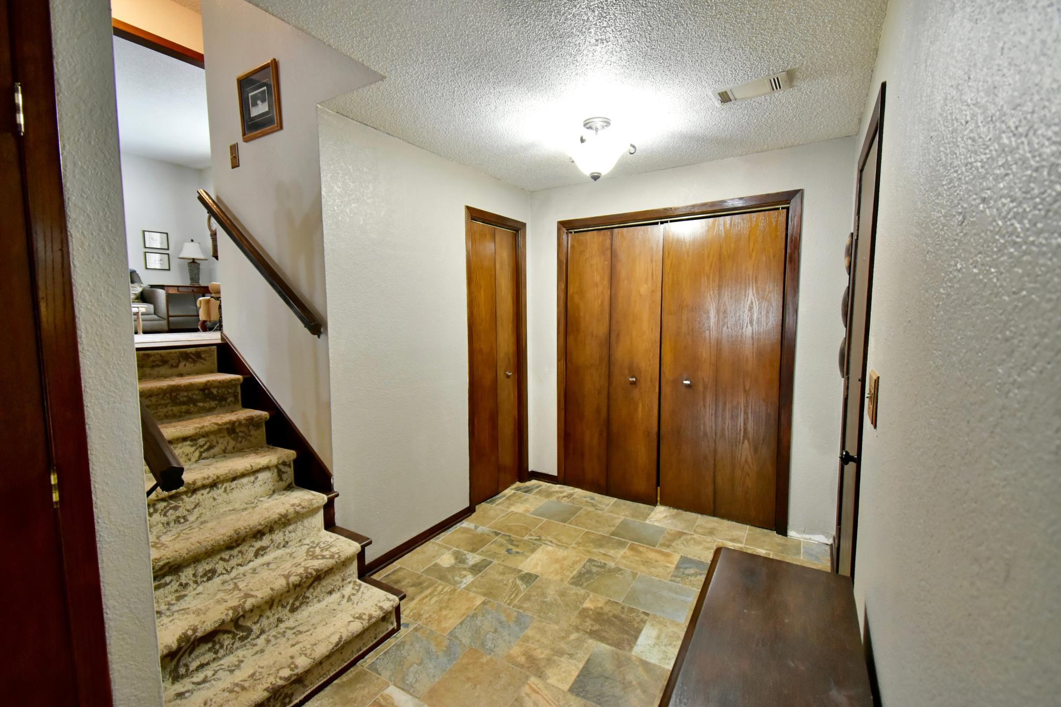 Lower level, tile entry off garage and family room.