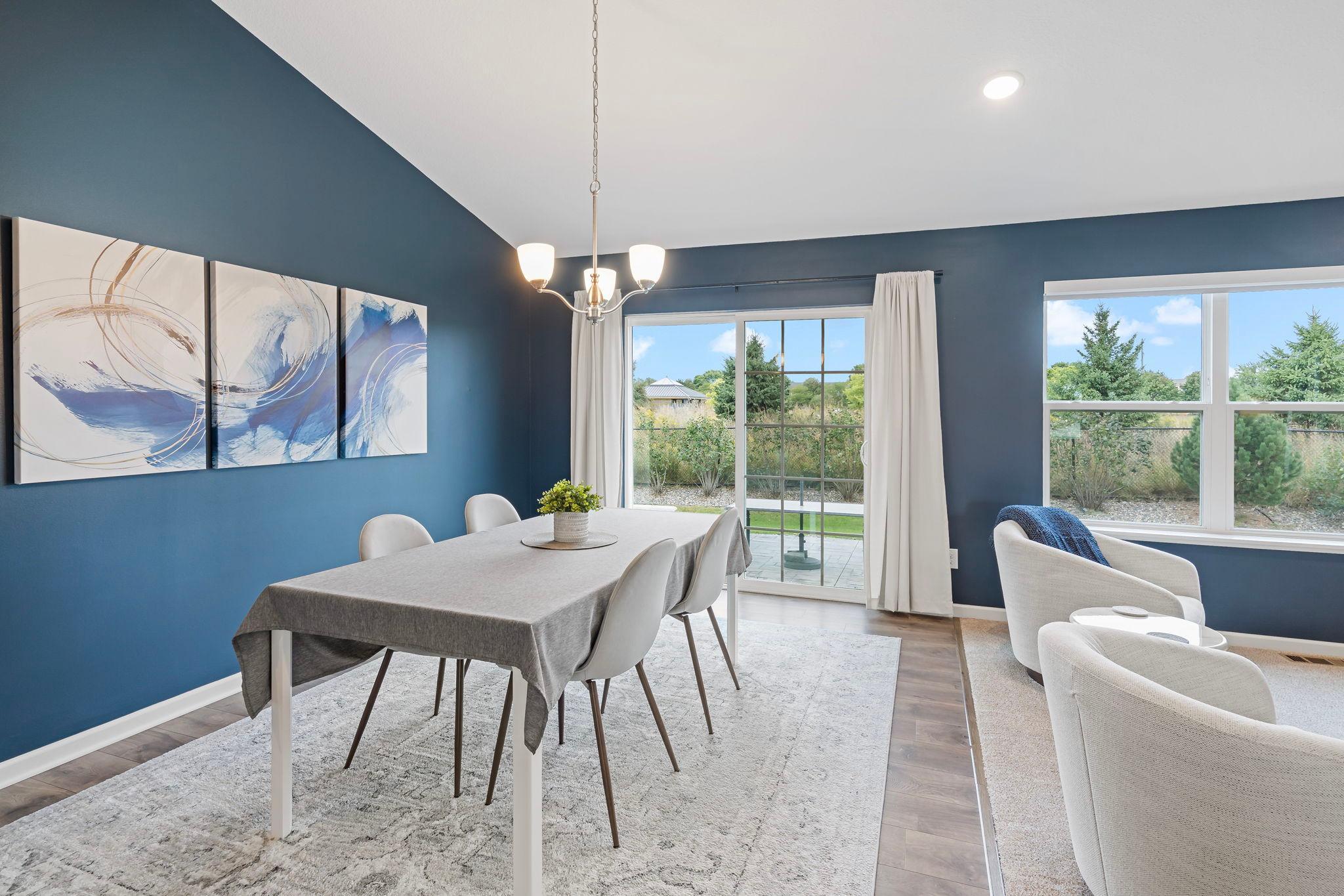 Dining area, with doors out to stamped concrete patio