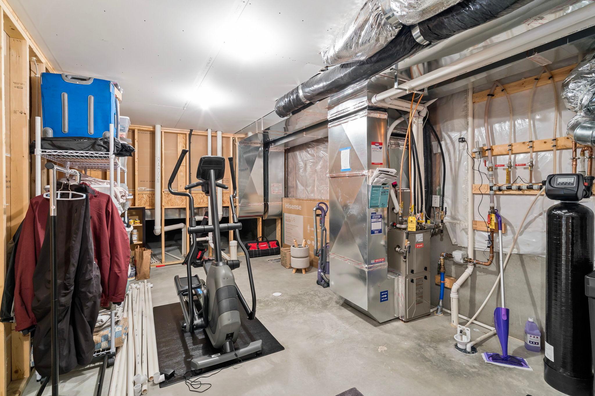 Back area is plumbed for a bathroom, doorway is framed.