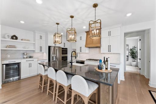 The kitchen is a home chefâs dream, complete with elegant fixtures and sleek cabinetry complemented by all-new stainless steel appliances.