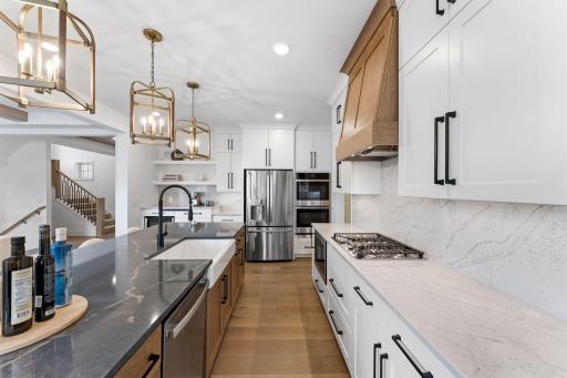 The inviting center island doubles as a breakfast bar, perfect for entertaining multiple guests
