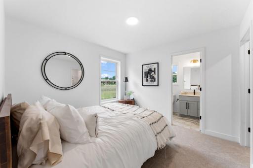 The sole bedroom on the first floor boasts access to an en-suite bathroom.