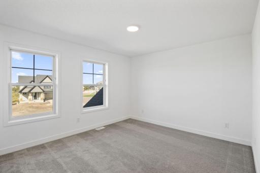 This sanctuary enjoys the largest footprint out of all the secondary bedrooms, providing residents the capability to add a custom work desk.