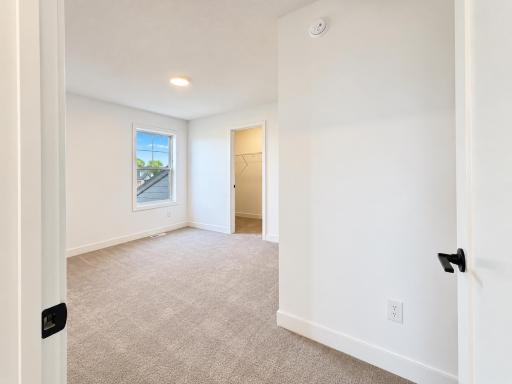 In a well-thought-out design, all three secondary bedrooms have direct access to a full-sized bathroom and a location on the quiet upper level.