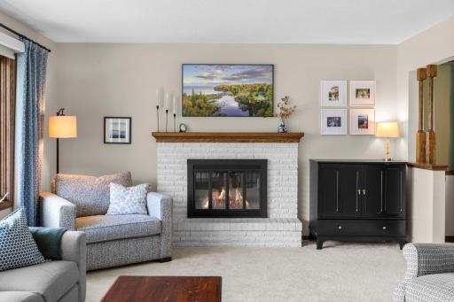 Pretty white washed fireplace.