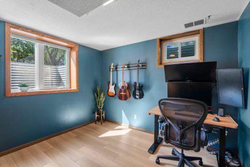 Bedroom #4 is located adjacent to the family room and features a new egress window.