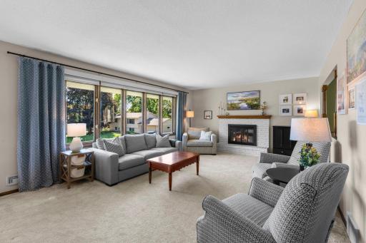The large living room is flooded with natural light