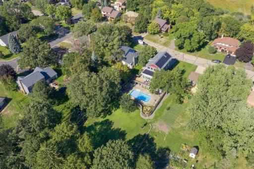 Unique overhead views shows the depth of the lot and extensive yard behind the pool area and fence. In the past it was used for large gardens with southwest exposure.