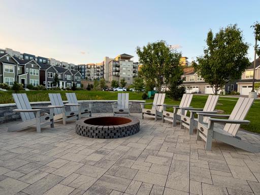 Community firepit area with plenty of seatingâa great spot to gather with neighbors and friends.