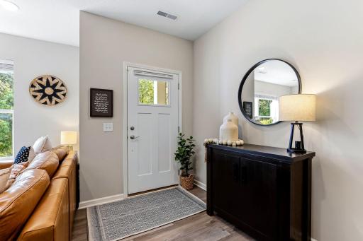 Bright and welcoming entry with modern finishes and plenty of natural light.