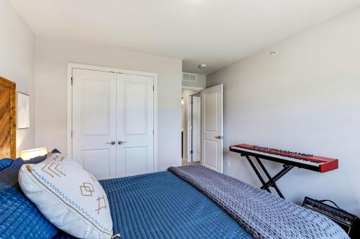 Another view of Bedroom 3 with a spacious closet and plenty of room for furniture.