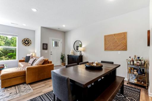 Open dining area with plenty of room for a large table and easy flow into the living room and kitchen.