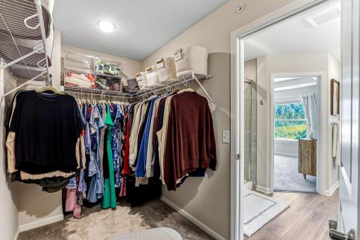 Spacious walk-in closet located right off the primary bathroom.