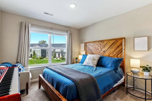 Bedroom 3 with plenty of natural light and a nice neighborhood view.