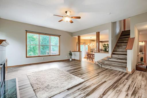 The great room reaches from the front of the house through to the back.