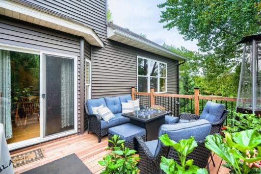 Enjoy privacy and a wooded area from this upper-level patio.