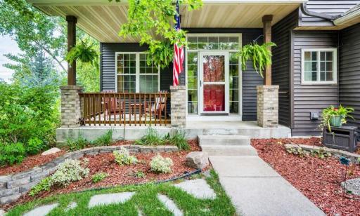 You will always feel at home in this modified 2-story home with a beautiful front porch