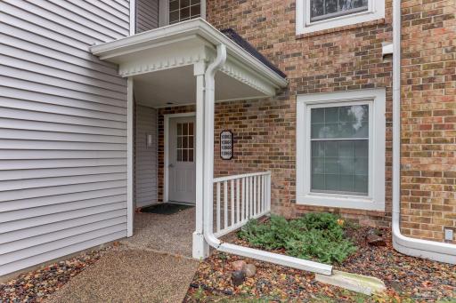 Covered entry provides a welcoming, sheltered approach to the buildingâs controlled access.