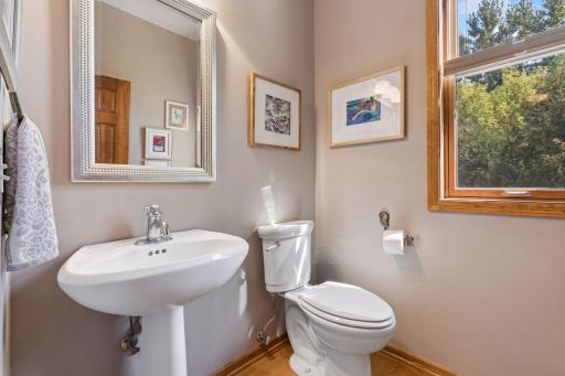 Main-floor powder room with pedestal sink