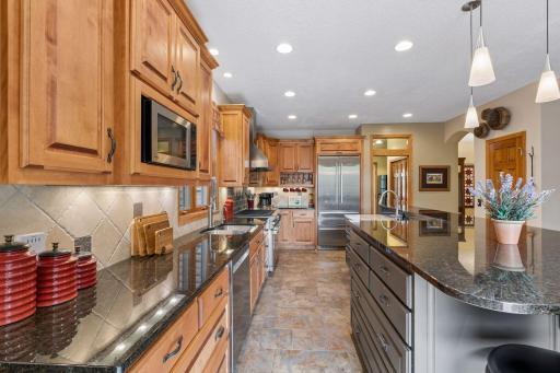 High end Liebherr refrigerator, prep sink, under-cabinet lighting