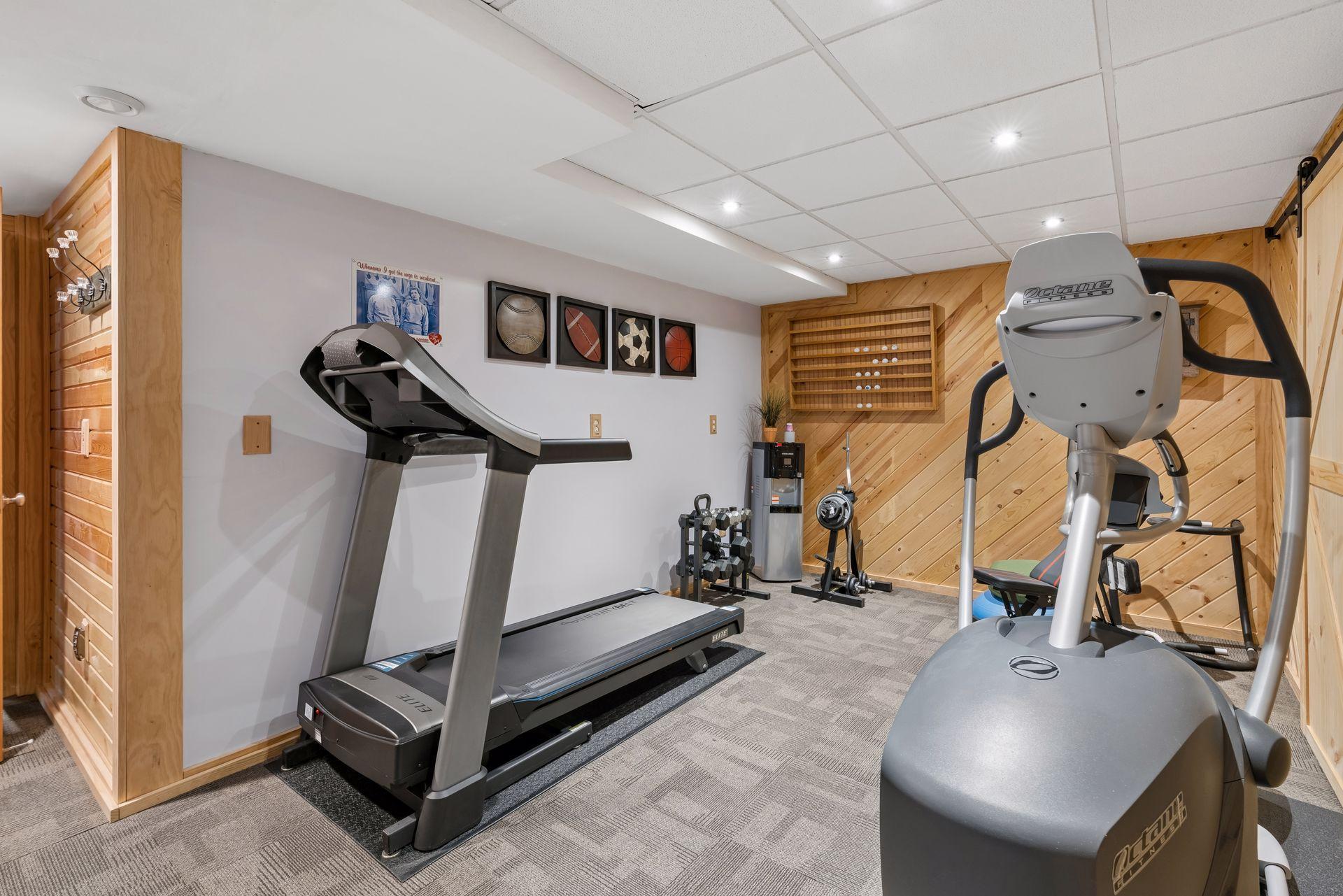 Lower level exercise room with cedar accent wall