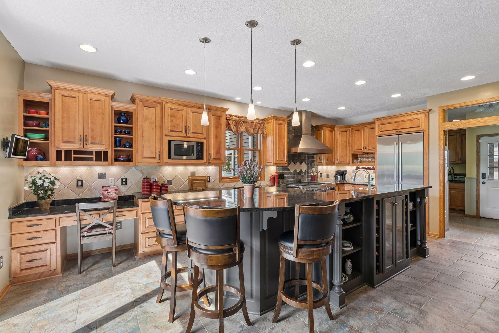 Built-in desk and open shelving off the kitchen