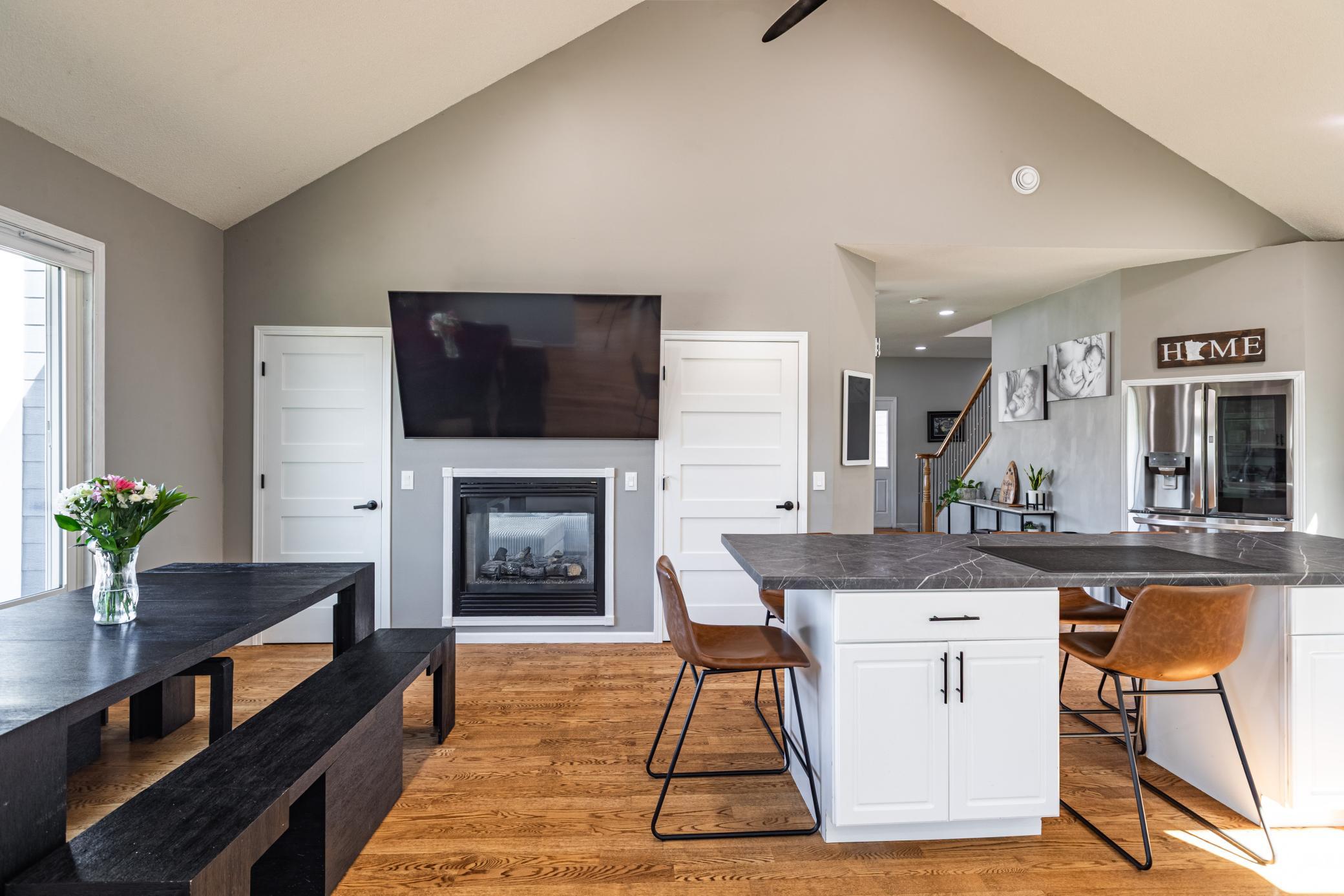 KITCHEN/DINING AREA WITH A 2 SIDED FIREPLACE