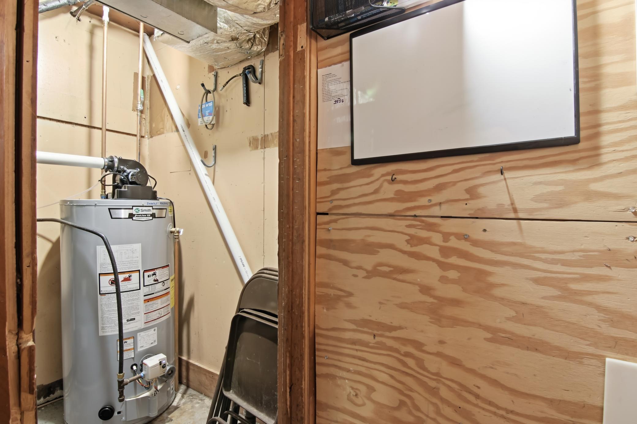 Mechanical Room. New Gas Water Heater!