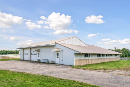 Additional outbuilding offer incredible versatility for storage, equipment, etc. Heated workshop and heated barn area. Concrete floors. Cold storage garage area.