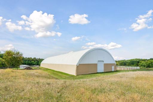Impressive large span arena/outbuilding offers incredible versatility for storage, equipment, agricultural use or indoor riding arena.
