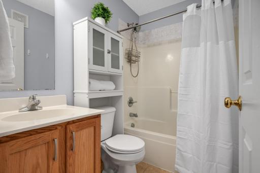 Upper-level Full Bath with tub/shower serves the two additional Bedrooms.