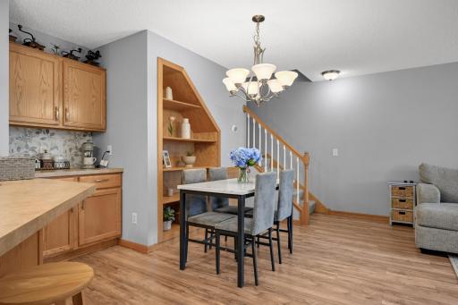 Dining area is conveniently located between the Living Room and Kitchen.