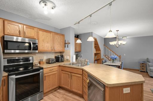 Plenty of cabinet and counter space with an open view into the Dining and Living areas.