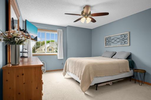 Spacious Primary Bedroom with a large window for plenty of natural light. With an acceptable offer, sellers will have brand-new upper-level carpet installed; bid has already been obtained.