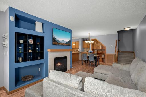 Gas Fireplace with built-in display and storage areas creates a great focal point in the Living Room.