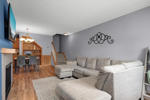 Open main-level layout provides an easy flow between the Living Room, Dining area and Kitchen.