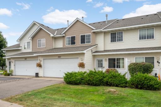 Two-story townhome with an attached 2-Car Garage and maintenance-free living.