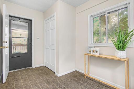 Over sized mudroom! This is a great space for bike storage, coats and winter gear or any of your outdoor toys.