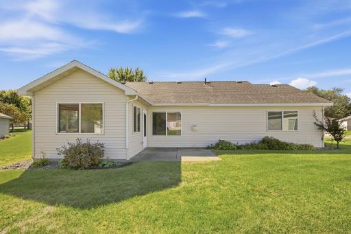 Steel siding, patio, attractive curb-appeal and underground sprinkling