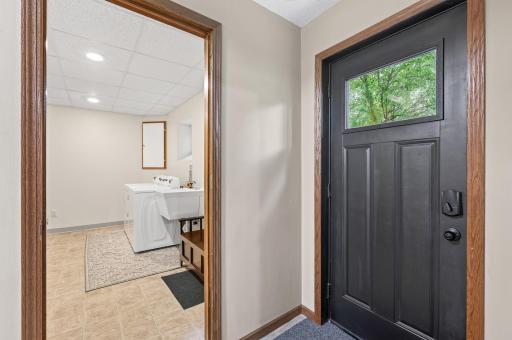 Lower Level Walkout Entrance. Perfect for an in-law suite or apartment with shared laundry facilities.