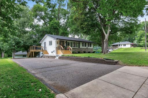 Side/FRT Elevation. One of Two Driveways on the Property. NEW ENTRY STEPS, DECK AND FLATWORK.