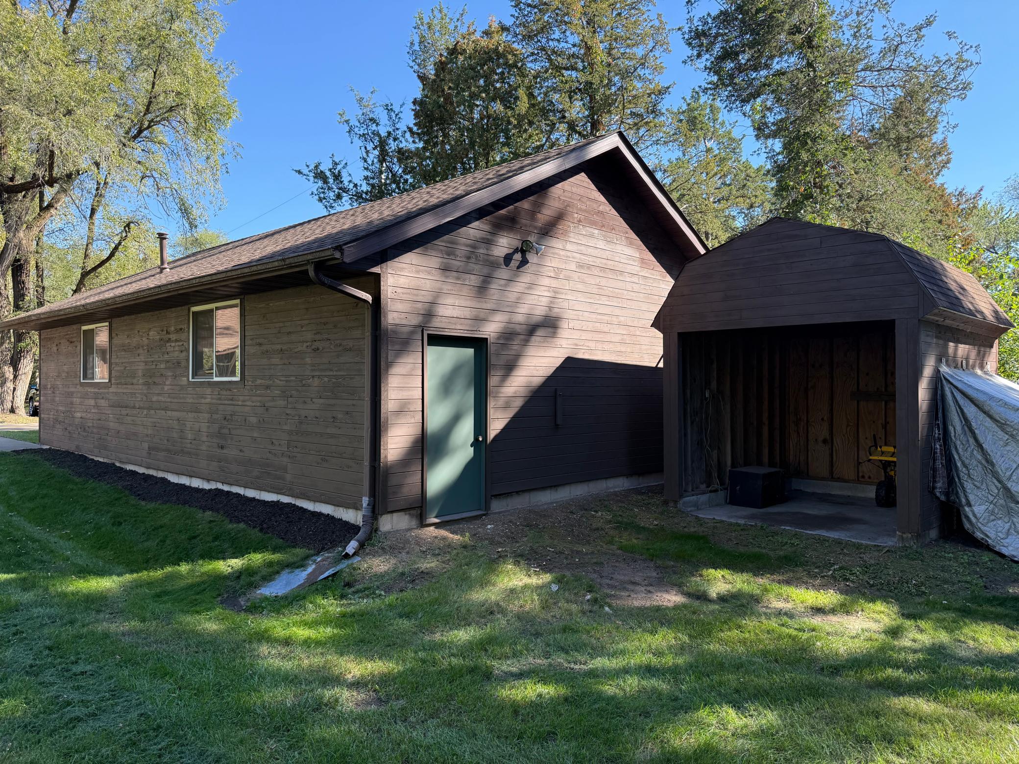 Storage shed next to garage