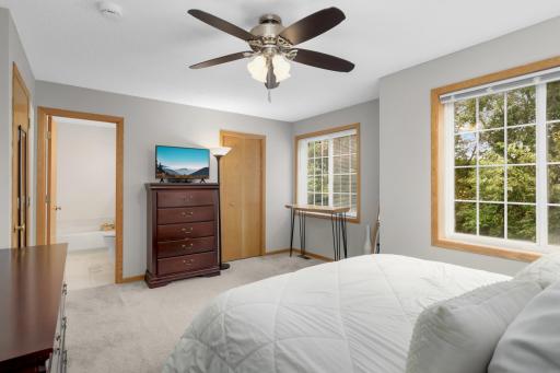 Convenient walkthrough to full bath and walk in closet.